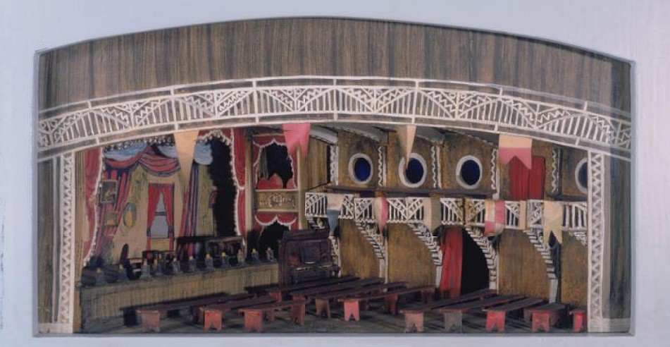 An ornate model of the interior of the set for the musical Showboat inside the Ziegfield Theatre
