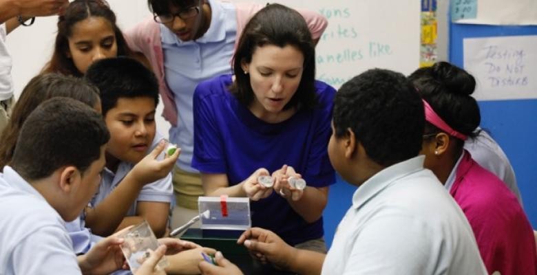 Kelley Remole, Zuckerman Institute's director of neuroscience outreach (center), answers local schoolchildren's questions on the brain.