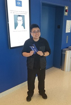 Nursing student Justin Tsui saved a man from an overdose on the Lower East Side as he was returning from a routine trip to the pharmacy. Justin Tsui, young man with black hair and glasses, holding a blue pouch