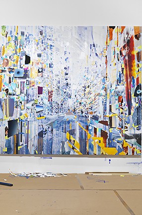 "After Studio" (2019), detail, Sarah Sze, mixed media; courtesy of Sarah Sze Studio. A colorful abstract painting hanging on a wall.