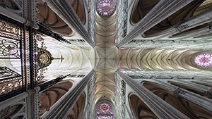 A view of the interior cruciform ceiling of Amiens Cathedral. Looking up at the ceiling of a cathedral.