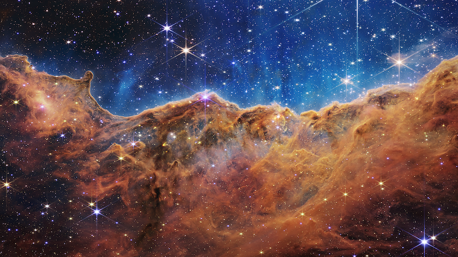 An image of the Carina Nebula taken by the James Webb Space Telescope. Credit: NASA, ESA, CSA, and STScI An area known as the "Cosmic Cliffs" in the Carina Nebula.