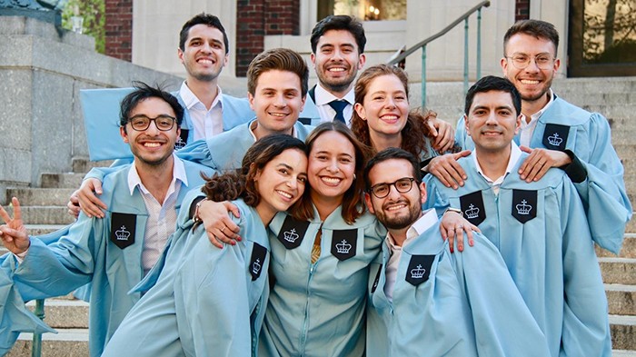 A group of friends on Earl Hall steps. 