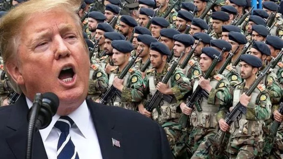 A white man speaking with soldiers in uniform in the background