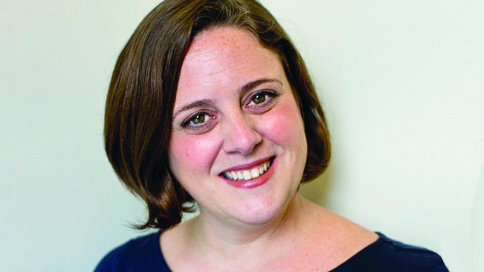 Jennifer Lena: a woman with short brown hair and rosy cheeks smiles for the camera.