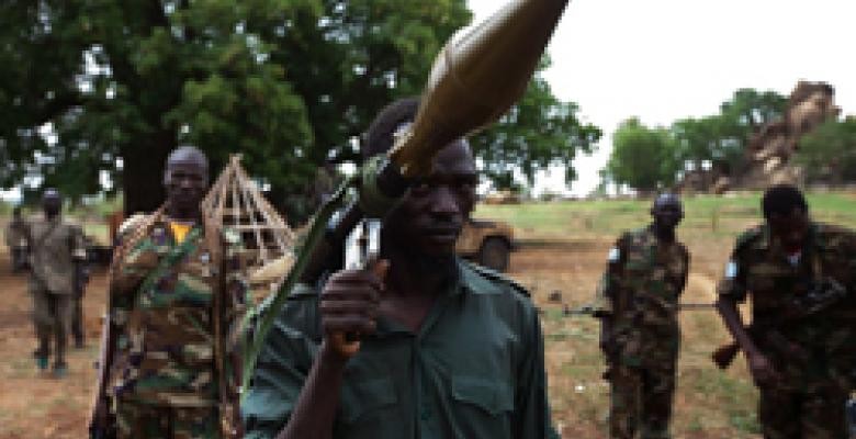 The long war leading to South Sudan's recent independence began during the powerful El Niño drought of 1983. In continuing hostilities, southern fighters display a grenade launcher captured from northern Sudanese, July 2011.