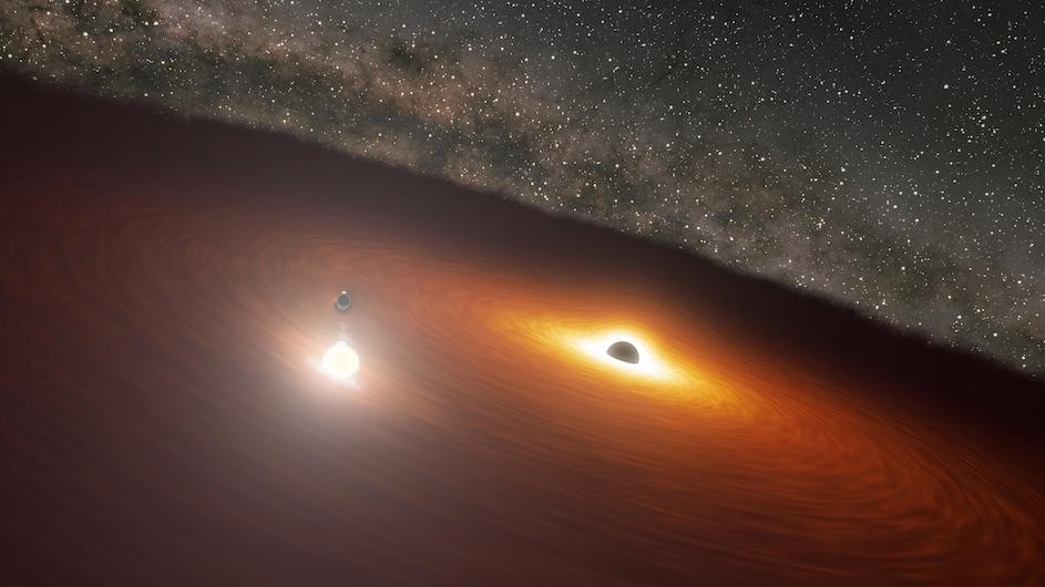 An illustration of two massive black holes in the OJ 287 galaxy.

