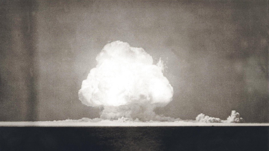 The First Atomic Explosion on July 16, 1945. Photograph taken at 9 seconds after the initial Trinity detonation shows the Mushroom cloud. Manhattan Project, World War 2. Alamogordo, New Mexico.