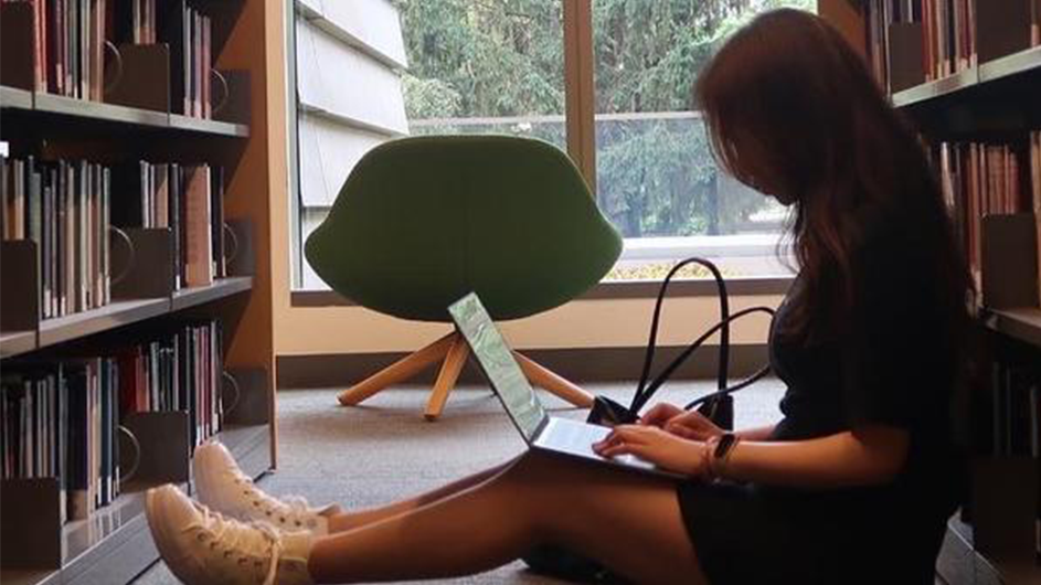 Zuyu Shen Zuyu Shen in the Libraries working on a laptop.