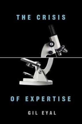 Book Cover: The Crisis Expertise in black with blue letters and a microschope