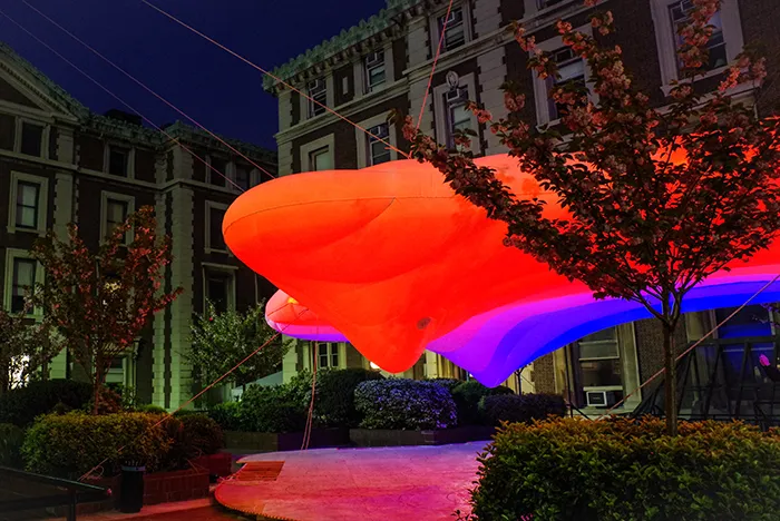 A floating red and blue cloud above Avery Pavillion