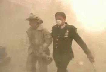 James McShane helping to rescue a firefighter on September 11, 2001