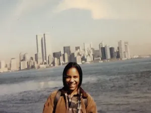 Christina Greer with Twin Towers in the background, 1996
