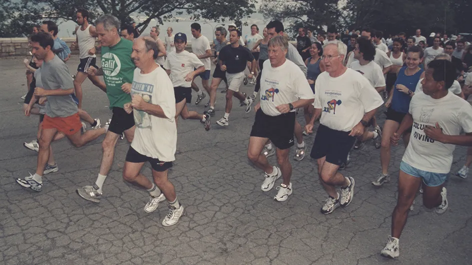 President Bollinger and students at the starting line of the 2002 Fun Run. 