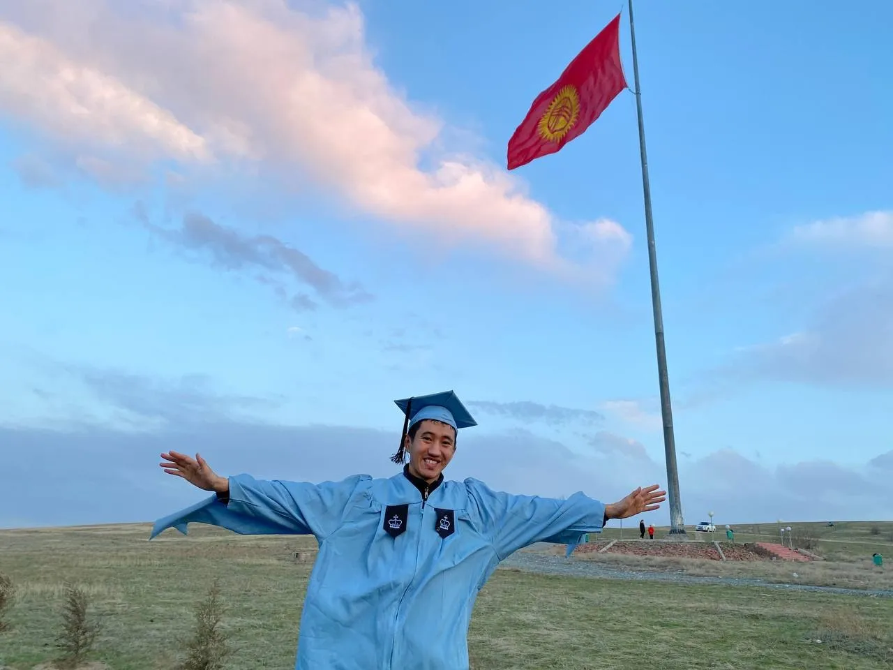 A Columbia grad in cap and gown