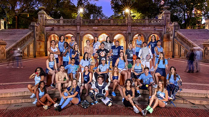 Representatives from 31 of Columbia's sports teams pose at Bethesda Fountain in Central Park. 