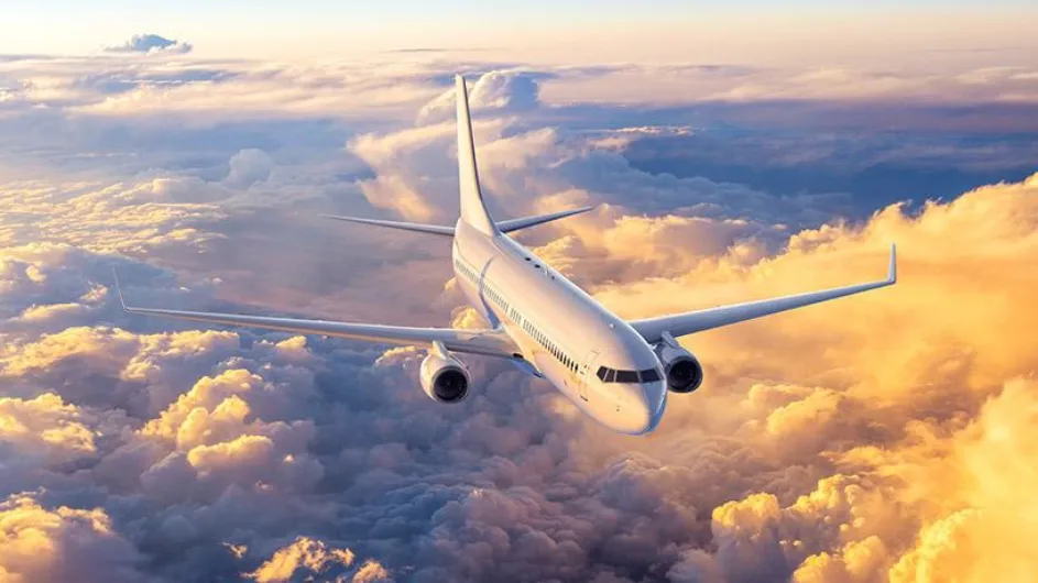 airplane flying through clouds