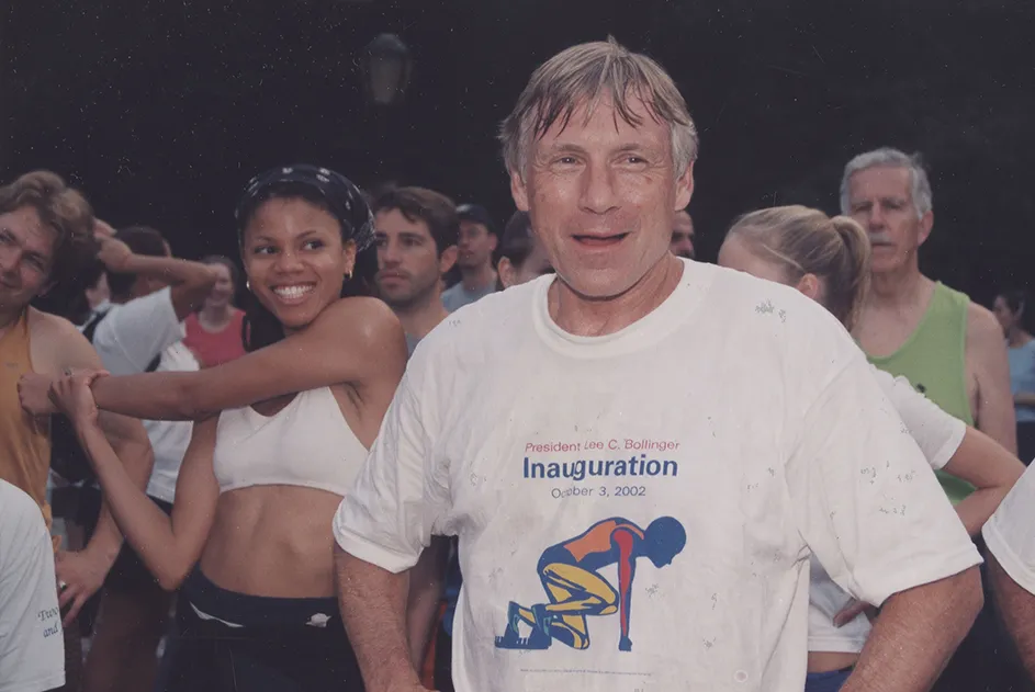 President Bollinger and Columbia students prepare and stretch to run the 5K Fun Run in Riverside Park in New York City.