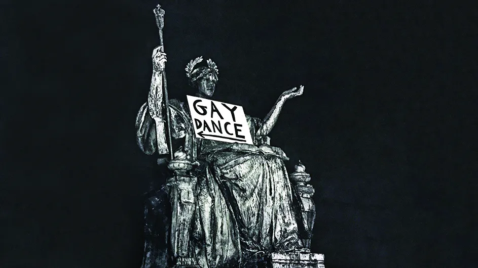 Alma Mater with a sign saying "Gay Dance"