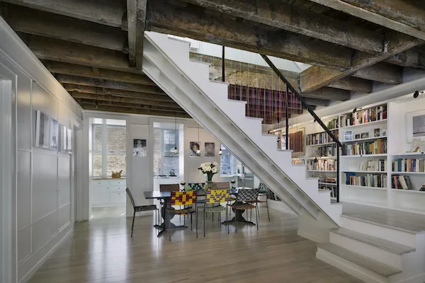 Solomonoff Architecture Studio’s 2011 design of a Greenwich Village townhouse features airplane cables in lieu of posts along the staircase.