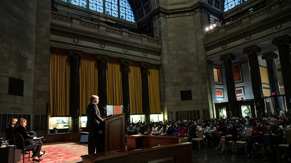 President Lee C. Bollinger speaking to an audience about Ukraine in Low Library