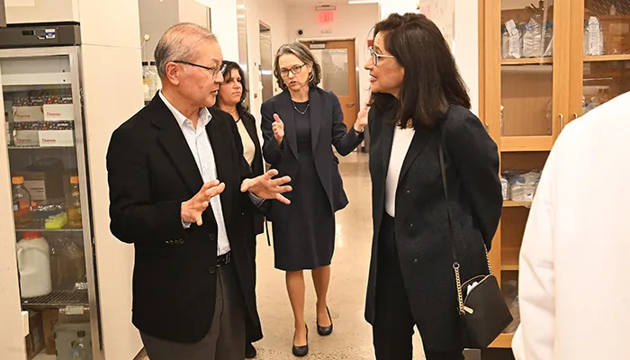 Dr. David Ho and Minouche Shafik at Columbia Medical Center.
