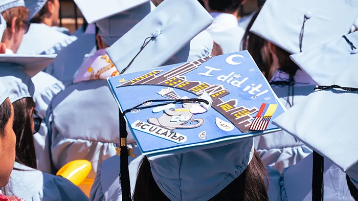 A mortar board that reads "I did it! #CULater." 