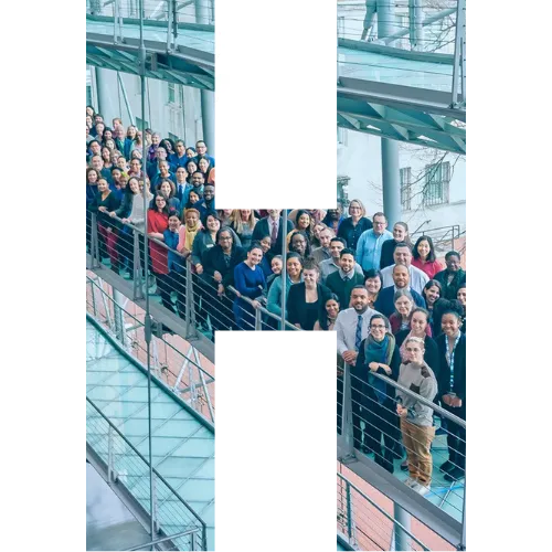 An H with a picture of the whole Columbia Health staff in it.