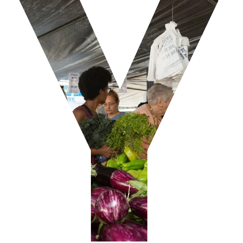 A block letter Y with a picture of a farmers market in it.