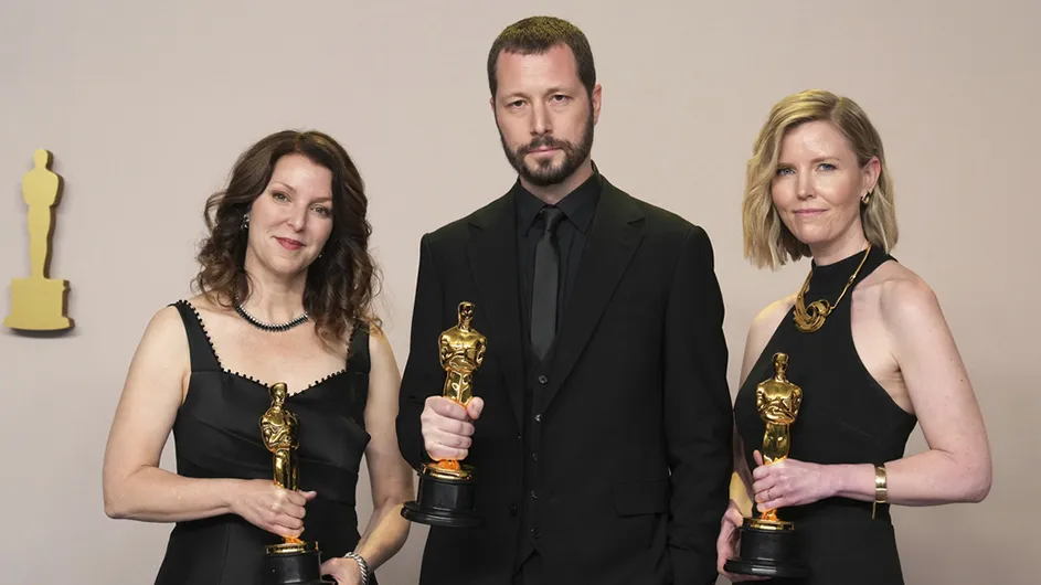 Producer Raney Aronson-Rath (JRN'95), Director Mstyslav Chernov, and Producer Michelle Mizner