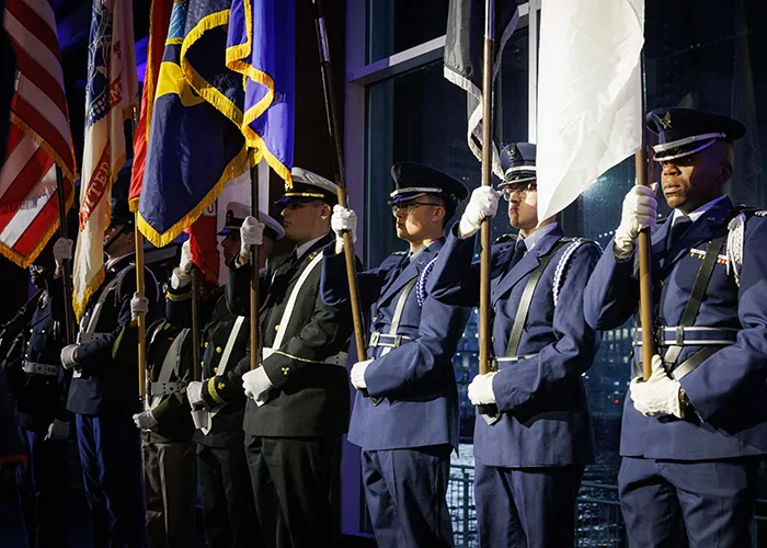An honor guard in various uniforms hold flags at Columbia's 2025 Military Ball.