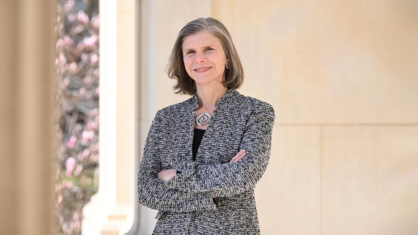 Provost Angela Olinto stands at the top of the steps of Low Library at Columbia's Morningside campus