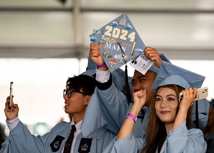 Graduates School of Arts and Sciences students celebrate. 
