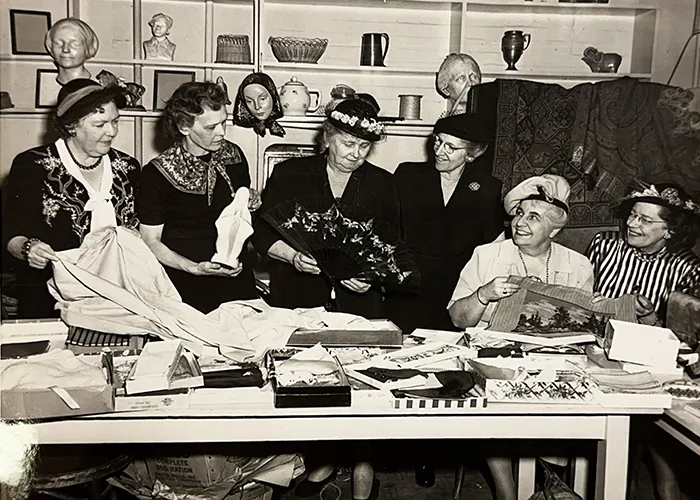 Six "faculty wives" who volunteered as CCCS' gift shop commitee. 
