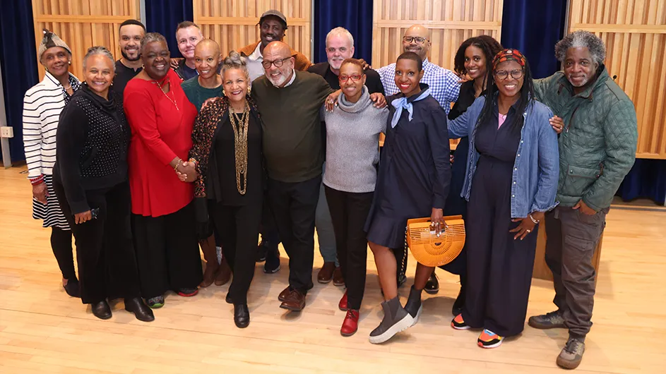 Fifteen Columbia Bundles Community Scholars from Upper Manhattan pose and smile with A'Lelia Bundles who founded the program. 