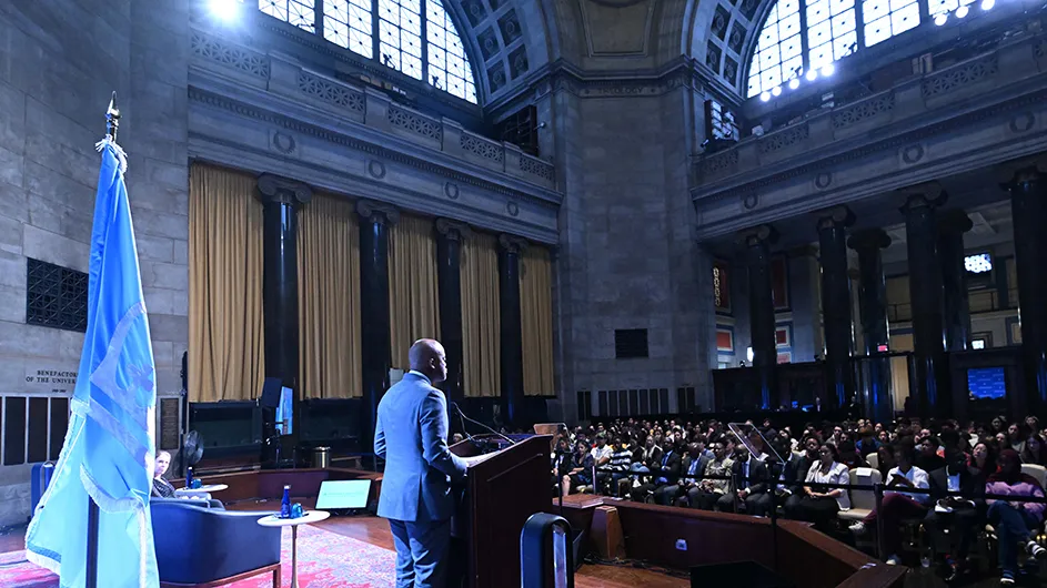 Wamkele Mene, Secretary-General of the African Continental Free Trade Area (AfCFTA), speaks at a podium on stage in front of hundreds of audience members in Low Rotunda at Columbia University World Leaders Forum.  