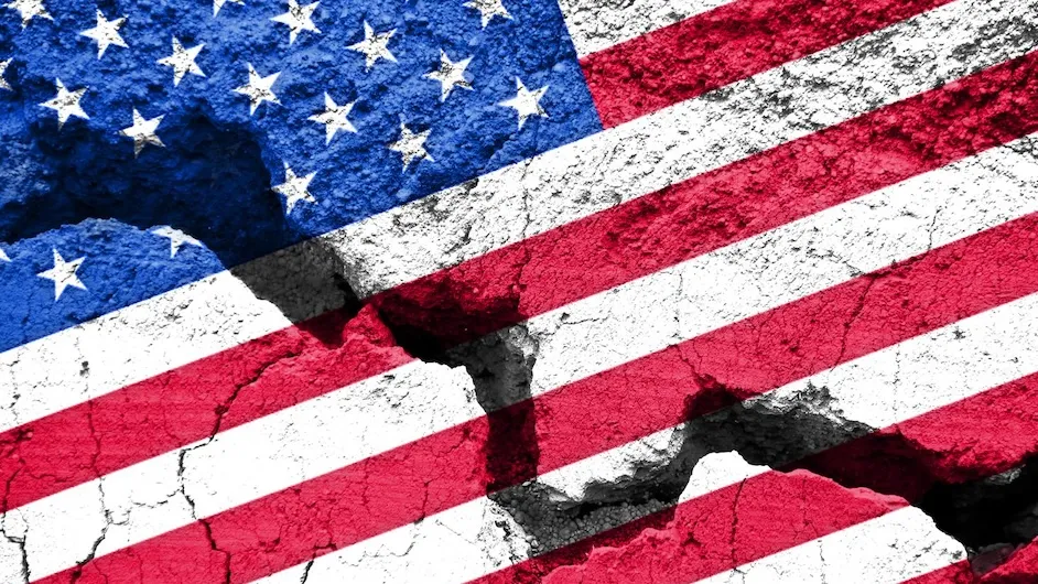 Image of U.S. flag with a crack down the middle highlighting rising division.