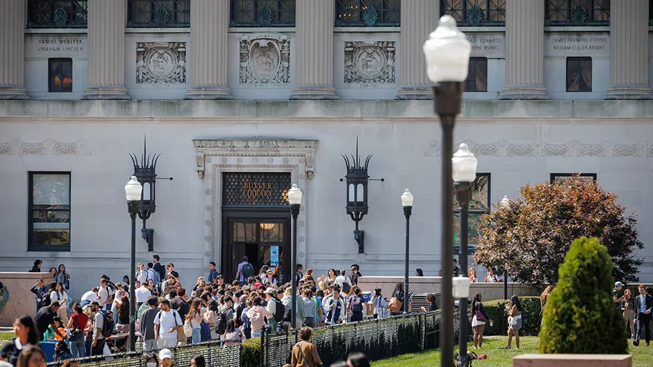 Students by Butler Library
