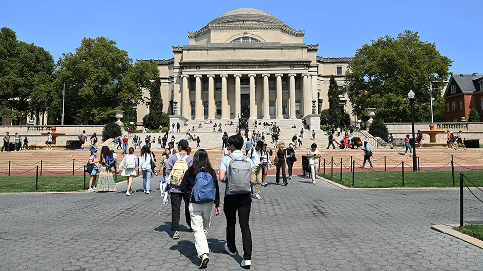 People on the walks in front of Low Library on Columbia's Morningside campus on a sunny day