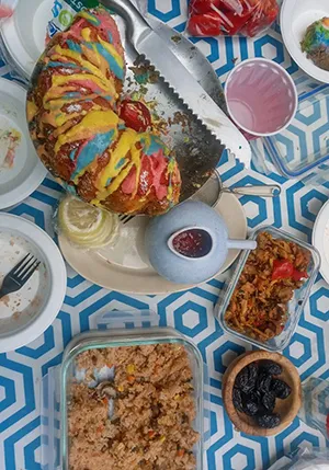 A 2025 Pride celebration potluck at the Gatehouse Garden. 
