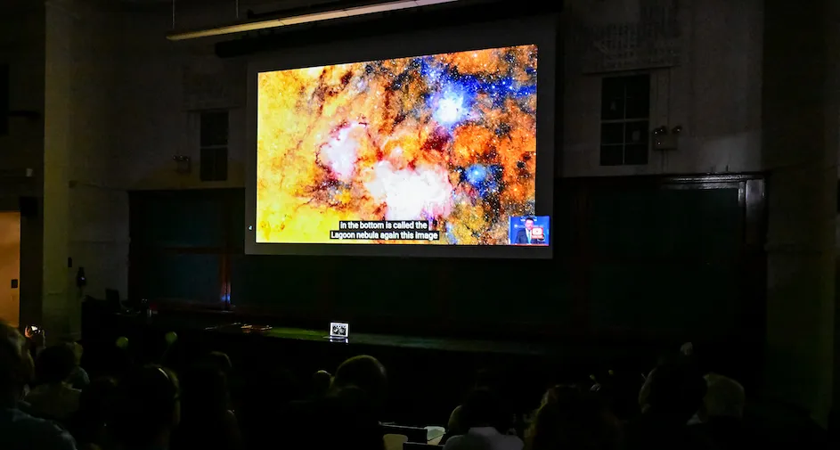 A livestream broadcast displays one of the first images collected by the new Vera Rubin Observatory.