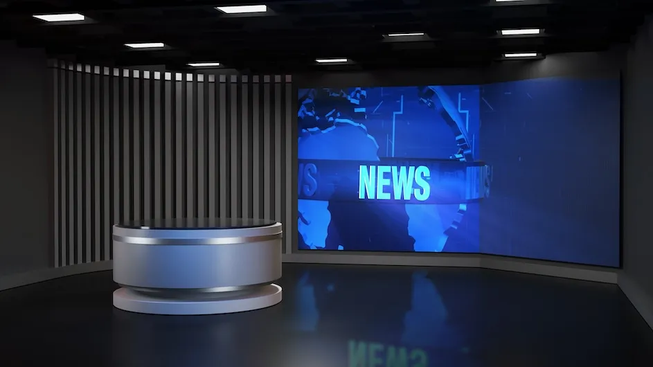 A photo of the inside of a television news studio.