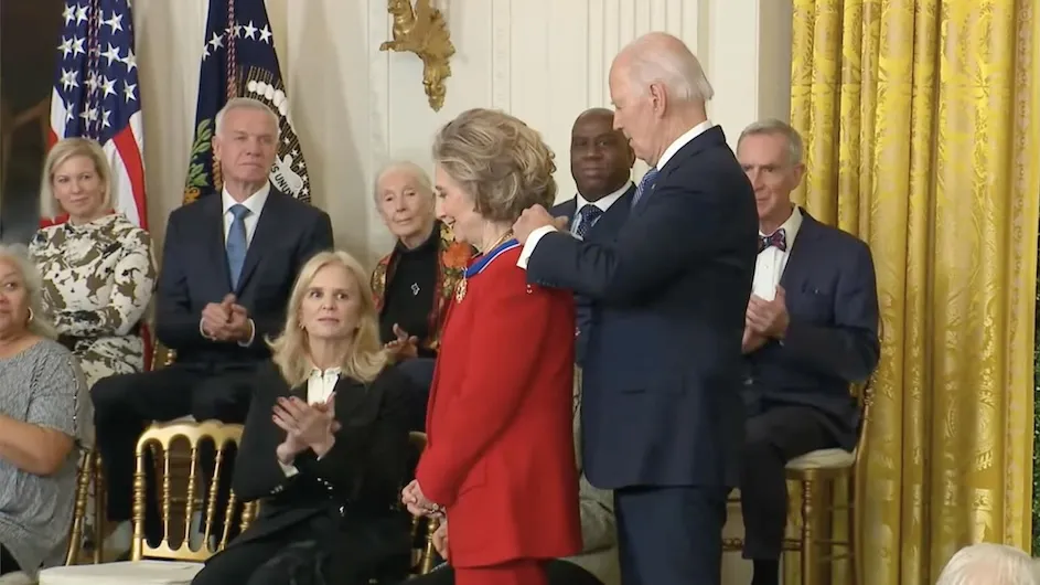President Joe Biden giving Secretary Hillary Rodham Clinton the Presidential Medal of Freedom at a January 4 White House ceremony