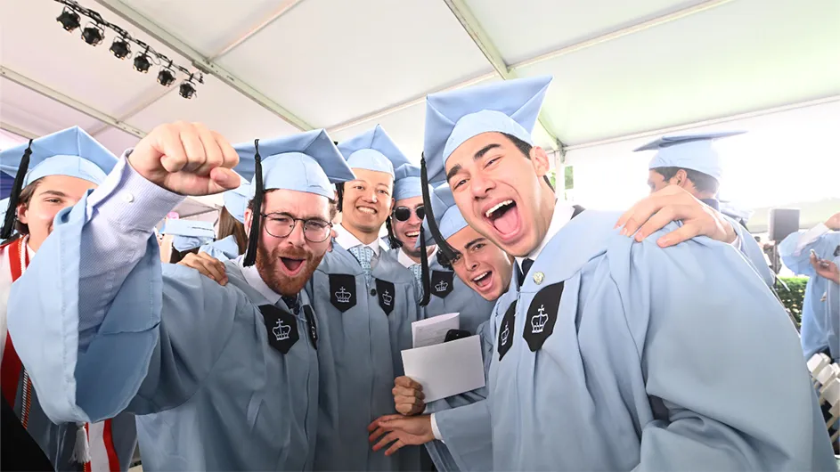 grads under class day tent