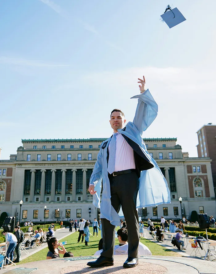 Kevin Walsh throws his hat on the sundial. 