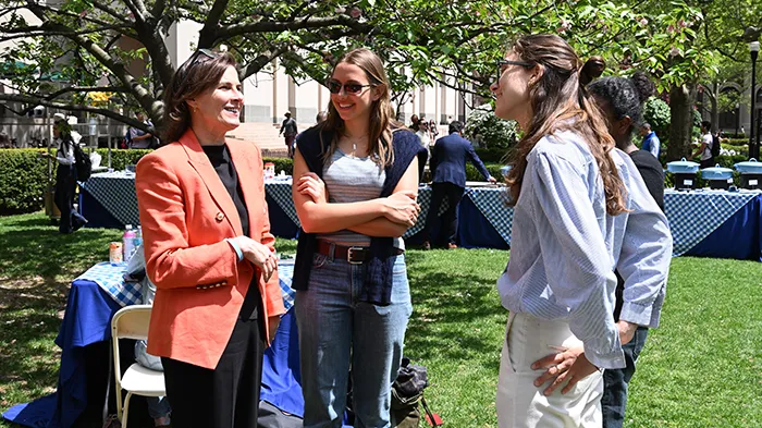 Acting President Claire Shipman talks to students.