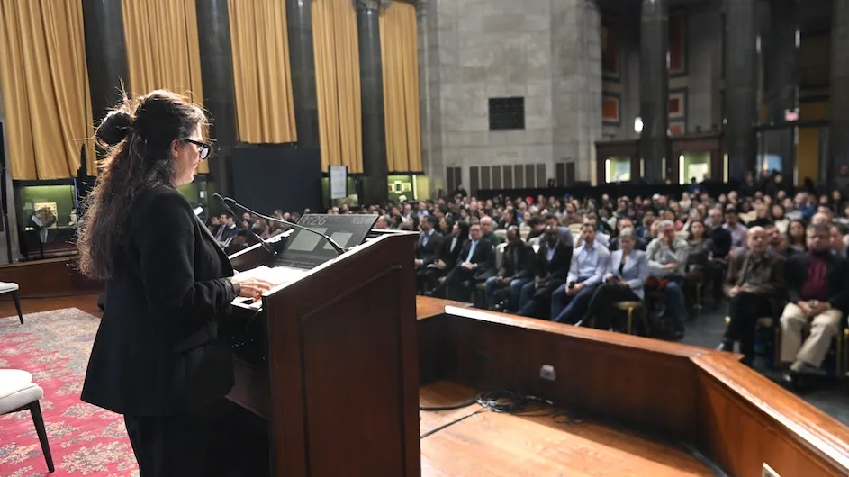 Lila Davachi, a professor of psychology, speaks to an audience in Low Memorial Library as part of the Columbia AI Summit.