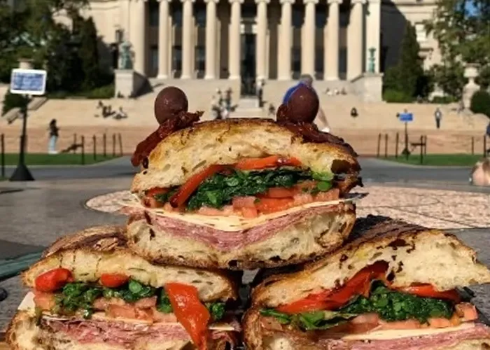 Three sandwiches in front of Low Library