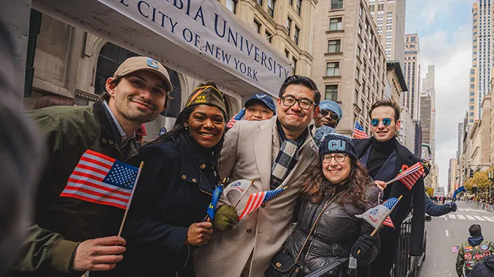 Dean Rosen-Metsch on the float with student veterans