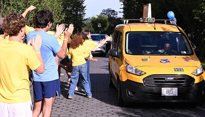 NSOP leaders welcome students by taxi and car. 